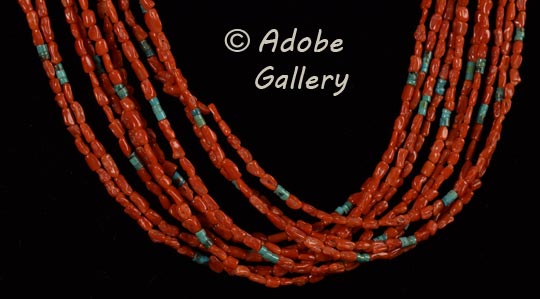 Close-up view of the coral and turquoise strands.