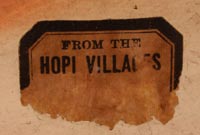 A label reading "From the Hopi Villages" appears on the base of the vessel.