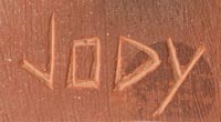 Artist signature of Jody Folwell, Santa Clara Pueblo Potter