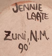Artist signature of Jennie Laate, Zuni Pueblo Potter