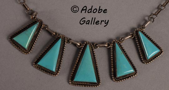 A closer view of the turquoise pendants.