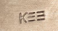 Artist initials and hallmark signature of Kee Yazzie, Diné of the Navajo Nation Jeweler