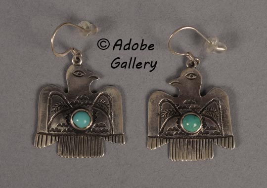 Earrings PAIR shown on a darker background.