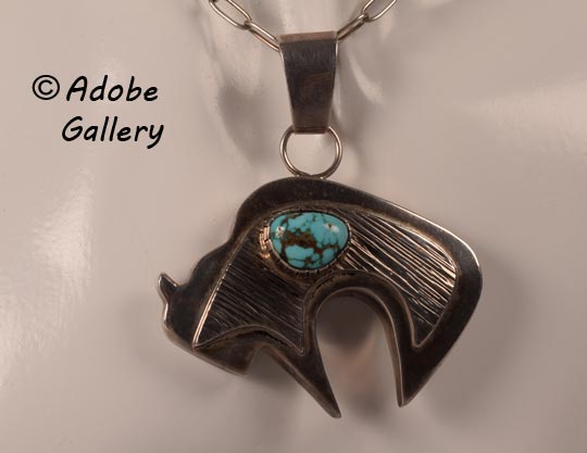 Alternate close-up view of the front of this turquoise bear pendant.