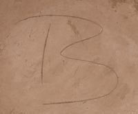 Artist initials or signature of Rachel Sahmie Nampeyo (1956-2022) Koo-Loo.  The Initials of her name (Rachel Sahmie) shown as RS.