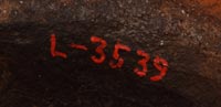 Also, there is an inventory number from an unidentified collection that appears on the bottom of the vessel in orange.