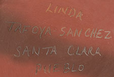 Artist signature of Linda Tafoya-Sanchez (1962 - ) Santa Clara Pueblo