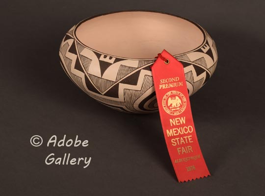 In 1976, Cheromiah crafted this extraordinary thin-walled bowl at Laguna. This piece was entered in the New Mexico State Fair that year and was awarded Second Premium, with the award ribbon accompanying the bowl.