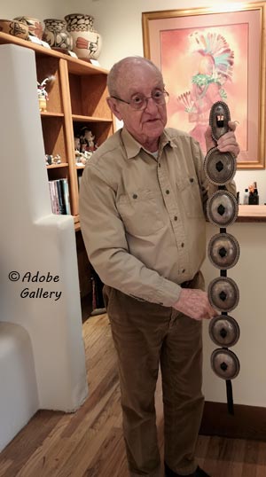 AL Anthony shows the scale of the conchos on this belt.