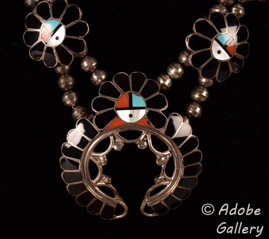 Alternate close-up view of the naja of this necklace.