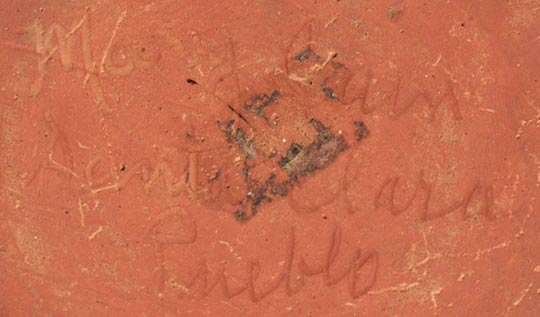 Artist signature of Mary Cain (Blue Rain), Santa Clara Pueblo Potter