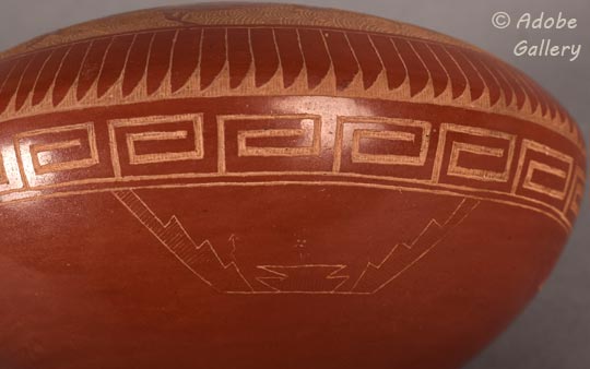 Alternate close-up view of a section of this pottery jar.