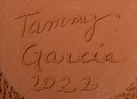 Artist signature of Tammy Garcia, Santa Clara Pueblo Potter