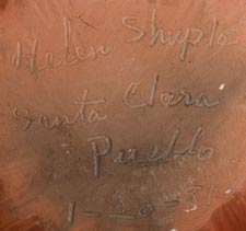 Artist signature of Helen Shupla, Santa Clara Pueblo Potter