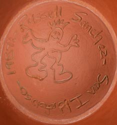 Artist signature of Russell Sanchez, San Ildefonso Pueblo Artist