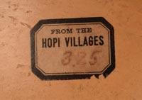 There is an original price tag stating, “Hopi Villages $3.25,” indicating its sale through the Fred Harvey Company.