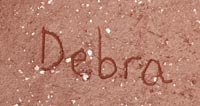 Artist signature of  Debra Trujillo Duwyenie of Santa Clara Pueblo