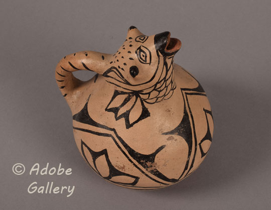 Alternate view of this pottery figurine.