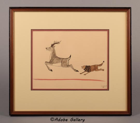 In “Wolf Chasing a Deer,” a wolf is depicted in determined pursuit of a mule deer, a scene commonly witnessed in the northern regions of New Mexico.