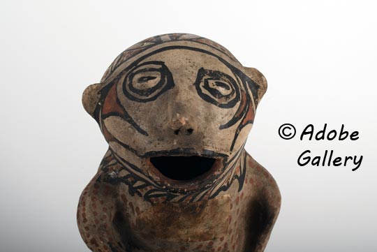 Alternate view of this pottery figurine.