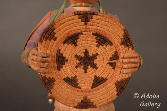 Close up view of the basket area of this Katsina Doll carving.