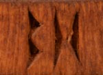 Artist carved initials of Brian Honyouti, Hopi Pueblo Carver