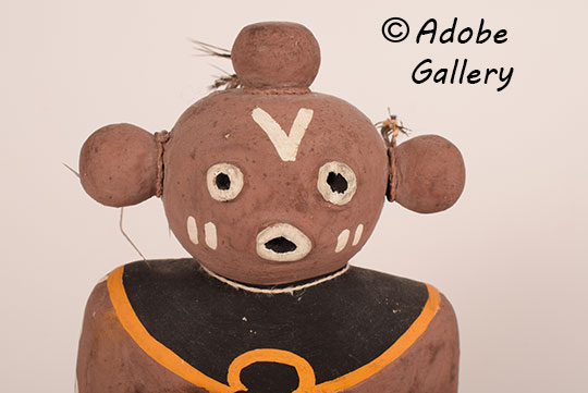 Alternate close up view of the face of this katsina doll.