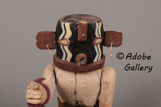 Alternate close up view of the face of this katsina doll.