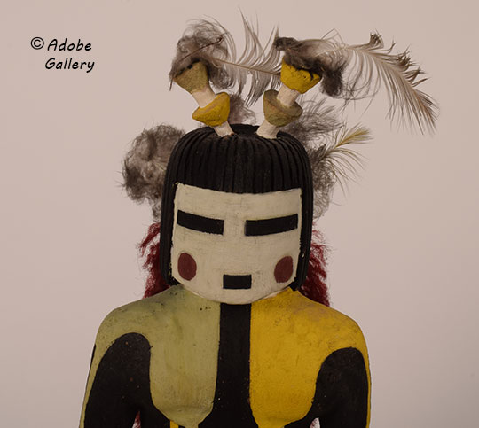 Alternate close up view of the face of this katsina doll.