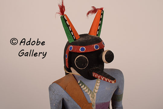 Alternate close up view of the face of this katsina doll.