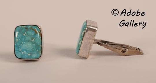 Alternate views of the two cufflinks.