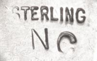 Stamped “STERLING NC” on the back of the naja.