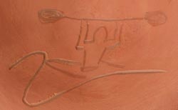 Artist signature of Russell Sanchez, San Ildefonso Pueblo Artist