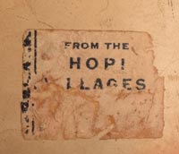 Affixed to the side of the jar is a historic label reading “From The Hopi Villages,” a rare marker that ties the piece from the era of the Fred Harvey Company. Fred Harvey was instrumental in popularizing Native American arts through his shops and hotels along the Santa Fe Railway, and he played a key role in introducing Nampeyo’s work to a broader audience. These labels were among the earliest forms of artist branding used in the promotion of Native pottery.