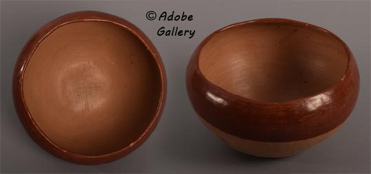 Alternate views of this pottery vessel.