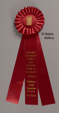 Kevin Pochoema entered this masterful one-piece carving into the 2026 Heard Museum Guild Indian Fair and Market in Phoenix, where it earned the prestigious Second Place award in the Juried Division.