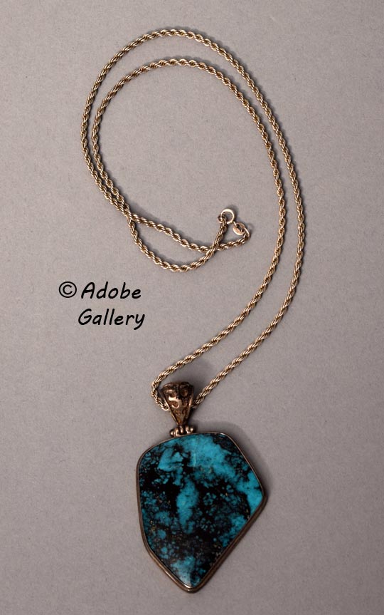 Another view of the pendant and the entire silver chain. Another view of the pendant and the entire silver chain.