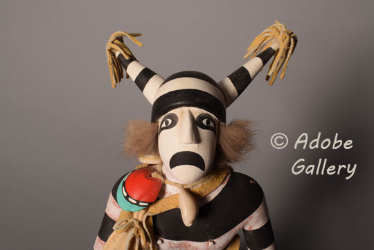 Alternate close up view of the face of this katsina doll.