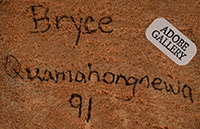 Artist signature of Bryce Quamahongnewa, Hopi Pueblo Carver