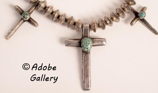Closer look at the crosses on this silver necklace. Closer look at the crosses on this silver necklace.