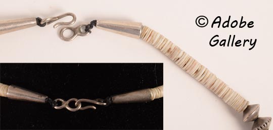 A simple hook and loop secures this necklace. A simple hook and loop secures this necklace.