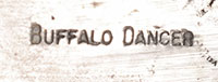 The name Buffalo Dancer is primarily associated with a famous jewelry studio and shop in Taos, New Mexico, that has been producing traditional Native American and Southwestern jewelry since 1974. While the name is often used as a collective hallmark for the studio, the primary Native jeweler most frequently associated with signing his work "Buffalo Dancer" is Lawrence Archuleta.