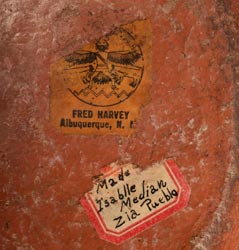 A paper label attached to the underside reads Fred Harvey Albuquerque N.M. 