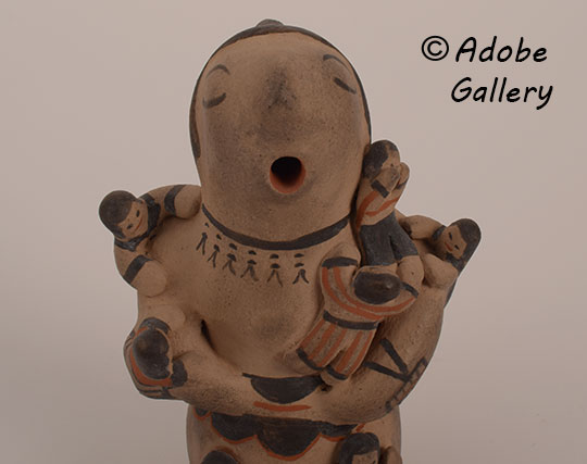 Alternate view of this pottery figurine.