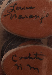 Artist signature of Louis Naranjo (1932 - 1997) Cochiti Pueblo