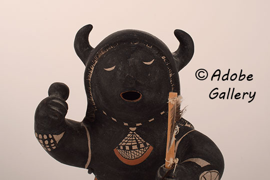 Alternate close up view of the face of this figurine.