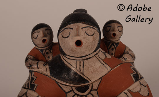 Close up view of the face of this figurine. Close up view of the face of this figurine.