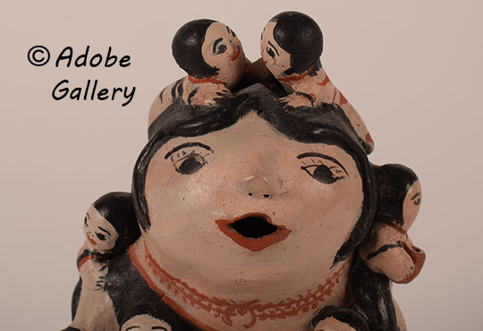 Close up view of the face of this figurine. Close up view of the face of this figurine.