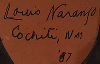 Artist signature of Louis Naranjo (1932 - 1997) was born at Cochiti Pueblo