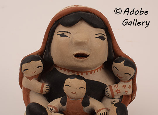 Close up view of the face of this Katsina Doll.